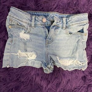 Ripped Jean shorts.